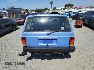 1996 Jeep Cherokee SE with VIN 1J4FT28S1TL108840, listed as a Copart auction lot 46951195 with 257,004 mi miles and Salvage Title. Bid and sale history available at carsss.com. Image 6.