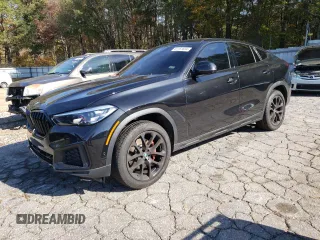 2023 BMW X6 xDrive40i z VIN 5UXCY6C04P9P46153, wystawiony jako Copart lot #81151634 z przebiegiem Nie podano mil oraz Szkody całkowita. Historia ofert i sprzedaży dostępna na DreamBid. Obrazek 1.
