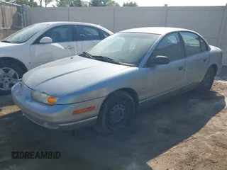 2002 Saturn SL z VIN 1G8ZH52832Z275788, wystawiony jako IAAI lot #42465553 z przebiegiem Nie podano mil oraz . Historia ofert i sprzedaży dostępna na DreamBid. Obrazek 2.