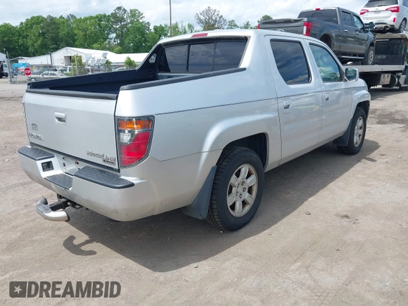 2006 Honda Ridgeline RTL with VIN 2HJYK16566H550339, listed as a IAAI auction lot 42223323 with 240,372 mi miles and . Bid and sale history available at DreamBid. Image 4.