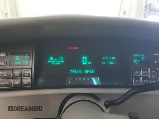 1994 Cadillac DeVille z VIN 1G6KD52B7RU290139, wystawiony jako Copart lot #46899465 z przebiegiem 133 110 mil mil oraz Czysty tytuł • Clean title. Historia ofert i sprzedaży dostępna na DreamBid. Obrazek 9.