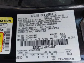 2014 Lincoln MKZ Hybrid z VIN 3LN6L2LU5ER831041, wystawiony jako IAAI lot #42447895 z przebiegiem 92 102 mil mil oraz . Historia ofert i sprzedaży dostępna na DreamBid. Obrazek 9.