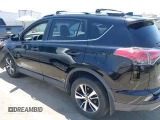 2018 Toyota RAV4 XLE with VIN 2T3WFREV2JW447623, listed as a IAAI auction lot 42410168 with 84,800 mi miles and . Bid and sale history available at DreamBid. Image 14.