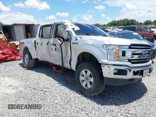 2018 Ford F-150 XL with VIN 1FTEW1EG6JFD14007, listed as a IAAI auction lot 36180966 with 124,521 mi miles and . Bid and sale history available at DreamBid. Image 1.