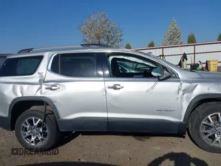2020 GMC Acadia SLT with VIN 1GKKNULS4LZ166119, listed as a IAAI auction lot 42109378 with 58,921 mi miles and . Bid and sale history available at DreamBid. Image 14.