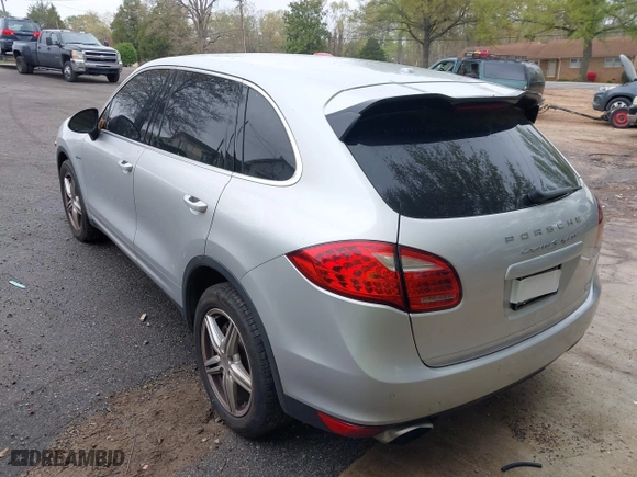 2012 Porsche Cayenne S Hybrid with VIN WP1AE2A2XCLA90082, listed as a IAAI auction lot 41960714 with 139,081 mi miles. Bid and sale history available at carsss.com. Image 3.