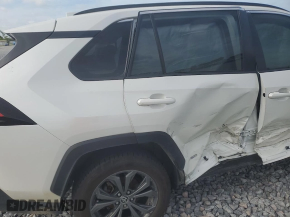 2022 Toyota RAV4 Hybrid XLE Premium with VIN JTMB6RFV4ND535282, listed as a Copart auction lot 61249445 with 82,398 mi miles and Salvage title. Bid and sale history available at DreamBid. Image 11.