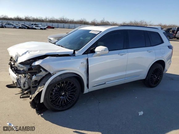 2021 Cadillac XT6 Sport with VIN 1GYKPGRS2MZ175735, listed as a Copart auction lot 88703045 with 26,902 mi miles and Salvage Title. Bid and sale history available at carsss.com. Image 1.