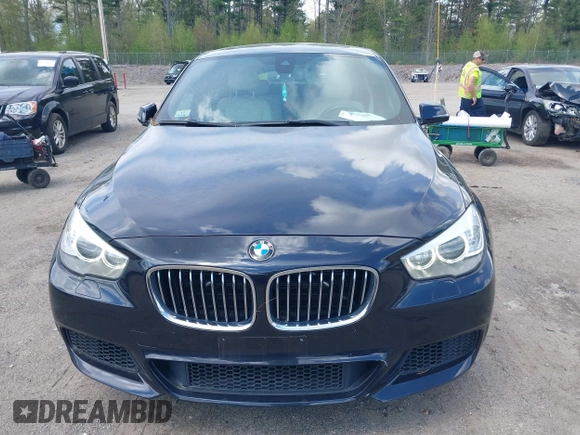2014 BMW 5 Series 535i Gran Turismo xDrive with VIN WBA5M4C52ED183844, listed as a IAAI auction lot 42227214 with 104,098 mi miles and . Bid and sale history available at DreamBid. Image 18.
