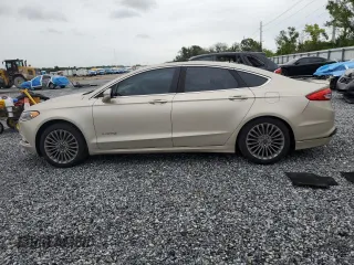 2017 Ford Fusion Hybrid Titanium with VIN 3FA6P0RU5HR359714, listed as a Copart auction lot 59156975 with 84,220 mi miles and Salvage title. Bid and sale history available at DreamBid. Image 2.