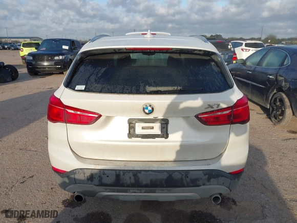 2016 BMW X1 xDrive28i with VIN WBXHT3C3XGP889461, listed as a IAAI auction lot 41757627 with 105,681 mi miles. Bid and sale history available at carsss.com. Image 16.