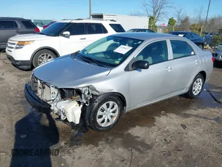 2009 Toyota Corolla with VIN 2T1BU40E49C155993, listed as a IAAI auction lot 41588637 with 183,548 mi miles. Bid and sale history available at carsss.com. Image 2.