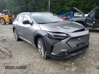 2023 Subaru Solterra Premium z VIN JTMABABA9PA006278, wystawiony jako Copart lot #60507653 z przebiegiem 5604 mil mil oraz . Historia ofert i sprzedaży dostępna na DreamBid. Obrazek 4.