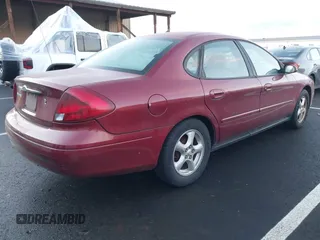 2002 Ford Taurus SE Standard z VIN 1FAFP53U32G242170, wystawiony jako IAAI lot #41299039 z przebiegiem 99 928 mil mil oraz . Historia ofert i sprzedaży dostępna na DreamBid. Obrazek 4.