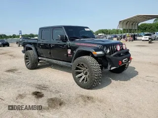 2020 Jeep Gladiator Rubicon with VIN 1C6JJTBG2LL166964, listed as a Copart auction lot 58041945 with 62,716 mi miles and Salvage title. Bid and sale history available at DreamBid. Image 13.