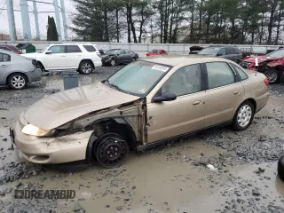 2001 Saturn LS z VIN 1G8JU52FX1Y566803, wystawiony jako Copart lot #84338304 z przebiegiem 144 674 mil mil oraz Szkody całkowita. Historia ofert i sprzedaży dostępna na DreamBid. Obrazek 1.