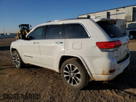 2017 Jeep Grand Cherokee Overland with VIN 1C4RJFCG3HC675125, listed as a Copart auction lot 50142865 with 113,819 mi miles and Salvage Title. Bid and sale history available at carsss.com. Image 2.