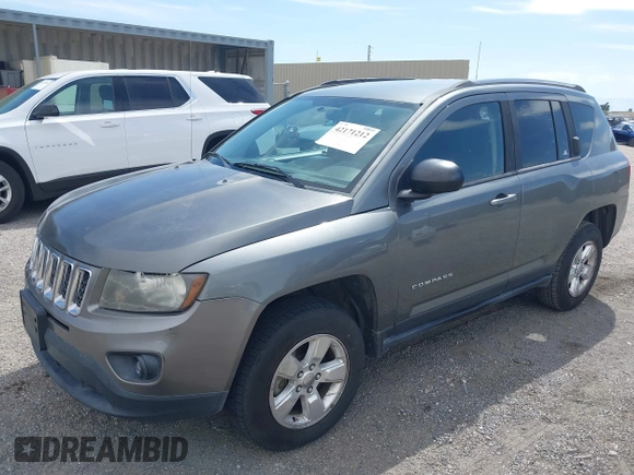 2014 Jeep Compass Sport with VIN 1C4NJCBA0ED524145, listed as a IAAI auction lot 42171212 with 187,257 mi miles. Bid and sale history available at carsss.com. Image 2.