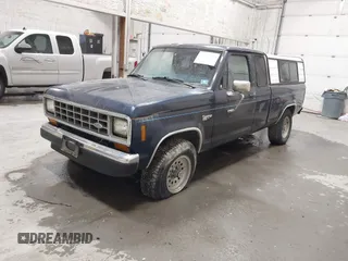 1987 Ford Ranger with VIN 1FTCR15T4HPA90767, listed as a IAAI auction lot 41637213 with 59,437 mi miles. Bid and sale history available at carsss.com. Image 2.