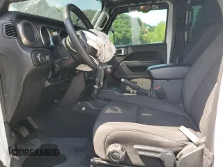 2023 Jeep Wrangler Sport with VIN 1C4HJXDGXPW596127, listed as a Copart auction lot 65395655 with 64,257 mi miles and Salvage title. Bid and sale history available at DreamBid. Image 7.