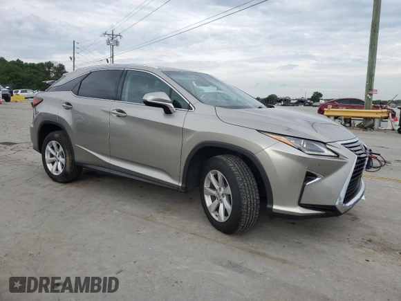 2017 Lexus RX 350 z VIN 2T2BZMCA2HC069523, wystawiony jako Copart lot #61055415 z przebiegiem 108 772 mil mil oraz Szkoda całkowita • Salvage title. Historia ofert i sprzedaży dostępna na DreamBid. Obrazek 4.