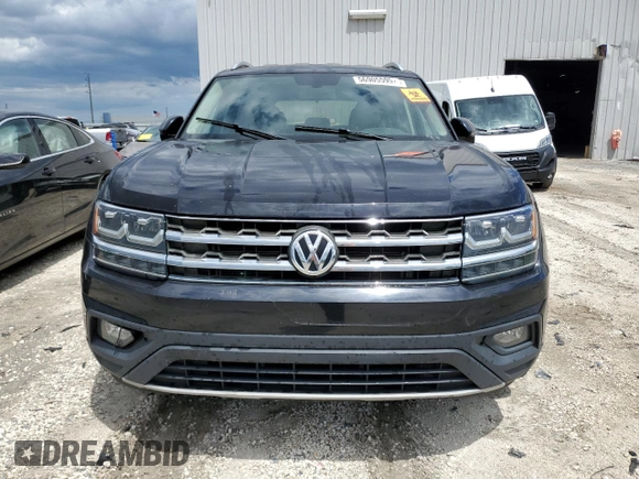 2018 Volkswagen Atlas SE z VIN 1V2CR2CA5JC582694, wystawiony jako Copart lot #56905595 z przebiegiem 111 842 mil mil oraz Czysty tytuł • Clean title. Historia ofert i sprzedaży dostępna na DreamBid. Obrazek 5.