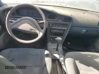 1989 Nissan Maxima z VIN JN1HJ01P6KT276487, wystawiony jako Copart lot #67424274 z przebiegiem Nie podano mil oraz Nie do naprawy. Historia ofert i sprzedaży dostępna na DreamBid. Obrazek 8.