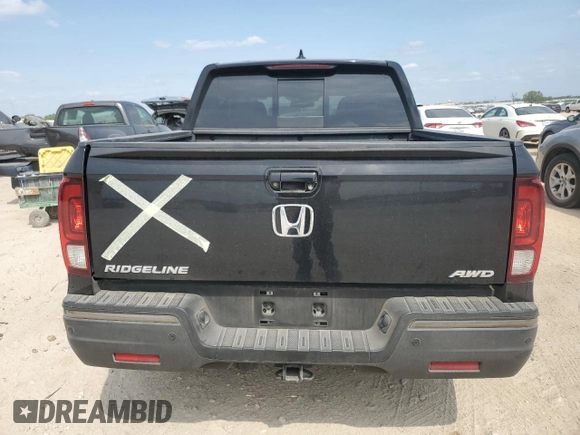 2017 Honda Ridgeline Black Edition with VIN 5FPYK3F81HB033590, listed as a Copart auction lot 53115525 with 128,971 mi miles and Salvage title. Bid and sale history available at DreamBid. Image 6.