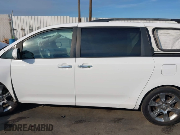 2014 Toyota Sienna SE with VIN 5TDXK3DC2ES472249, listed as a IAAI auction lot 41402101 with Not Provided miles and . Bid and sale history available at DreamBid. Image 13.