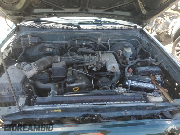 2002 Toyota Tacoma z VIN 5TENL42N72Z110771, wystawiony jako Copart lot #57313875 z przebiegiem 193 343 mil mil oraz Szkoda całkowita • Salvage title. Historia ofert i sprzedaży dostępna na DreamBid. Obrazek 11.