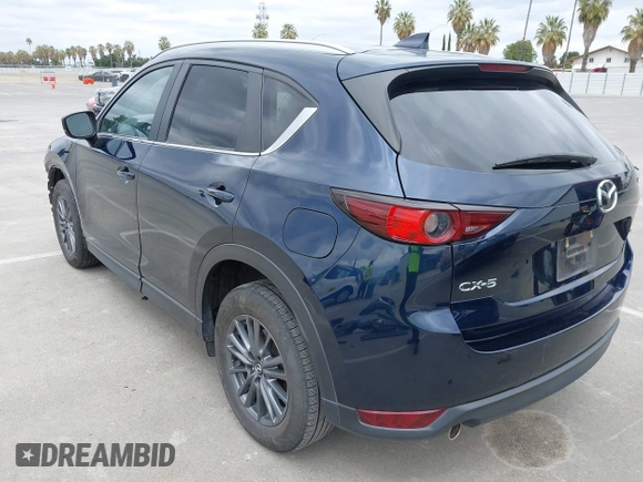2020 Mazda CX-5 Touring with VIN JM3KFACM2L0856777, listed as a IAAI auction lot 42073972 with 151,628 mi miles. Bid and sale history available at carsss.com. Image 3.