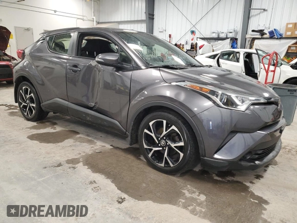 2019 Toyota C-HR XLE with VIN JTNKHMBX0K1035830, listed as a Copart auction lot 52561095 with 98,412 mi miles and Clean Title. Bid and sale history available at carsss.com. Image 4.
