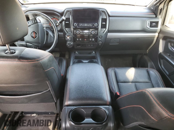 2021 Nissan Titan Pro-4X с VIN 1N6AA1ED2MN533749, выставлен на аукционе Copart как лот 54659655 с пробегом Не указан миль и Списание • Salvage title. История ставок и продаж доступна на DreamBid. Изображение 8.