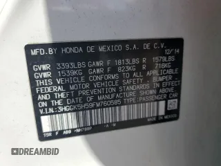 2015 Honda Fit LX z VIN 3HGGK5H59FM760585, wystawiony jako Copart lot #55737365 z przebiegiem 79 700 mil mil oraz Szkoda całkowita • Salvage title. Historia ofert i sprzedaży dostępna na DreamBid. Obrazek 12.