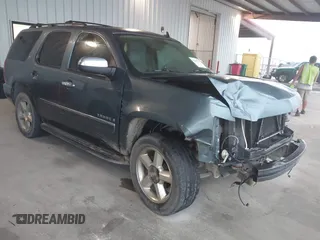 2009 Chevrolet Tahoe LTZ z VIN 1GNFC33J09R158491, wystawiony jako IAAI lot #42349370 z przebiegiem 187 025 mil mil oraz . Historia ofert i sprzedaży dostępna na DreamBid. Obrazek 1.