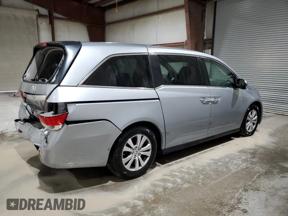 2017 Honda Odyssey EX-L with VIN 5FNRL5H65HB014638, listed as a Copart auction lot 48861475 with 97,788 mi miles and Salvage Title. Bid and sale history available at DreamBid. Image 3.