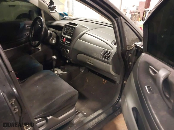 2004 Suzuki Aerio S with VIN JS2RA61S845202185, listed as a IAAI auction lot 41497079 with 96,925 mi miles. Bid and sale history available at carsss.com. Image 5.
