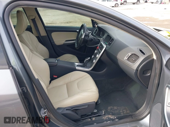2017 Volvo S60 Dynamic with VIN YV126MFL4H2430687, listed as a IAAI auction lot 41577059 with 57,027 mi miles. Bid and sale history available at carsss.com. Image 5.