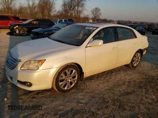 2009 Toyota Avalon XL with VIN 4T1BK36B19U339669, listed as a Copart auction lot 48547195 with 243,217 mi miles and Salvage Title. Bid and sale history available at carsss.com. Image 1.