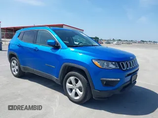 2019 Jeep Compass Latitude with VIN 3C4NJDBBXKT745210, listed as a IAAI auction lot 42027333 with 167,541 mi miles. Bid and sale history available at carsss.com. Image 1.