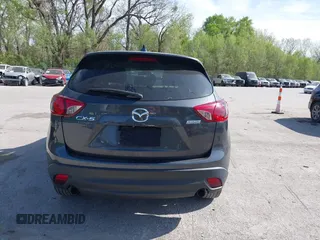 2016 Mazda CX-5 Touring z VIN JM3KE2CY4G0708972, wystawiony jako IAAI lot #42043013 z przebiegiem 157 573 mil mil oraz . Historia ofert i sprzedaży dostępna na DreamBid. Obrazek 16.