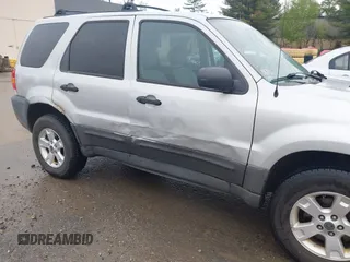2005 Ford Escape XLT with VIN 1FMCU93115KC10947, listed as a IAAI auction lot 42215066 with 128,475 mi miles and . Bid and sale history available at DreamBid. Image 6.