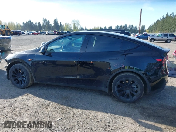 2021 Tesla Model Y Long Range with VIN 5YJYGDEE9MF301903, listed as a IAAI auction lot 42004007 with 26,740 mi miles. Bid and sale history available at carsss.com. Image 15.