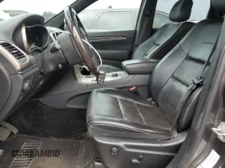 2014 Jeep Grand Cherokee Summit с VIN 1C4RJFJG6EC500348, выставлен на аукционе Copart как лот 59166275 с пробегом 104 623 миль миль и Списание • Salvage title. История ставок и продаж доступна на DreamBid. Изображение 7.