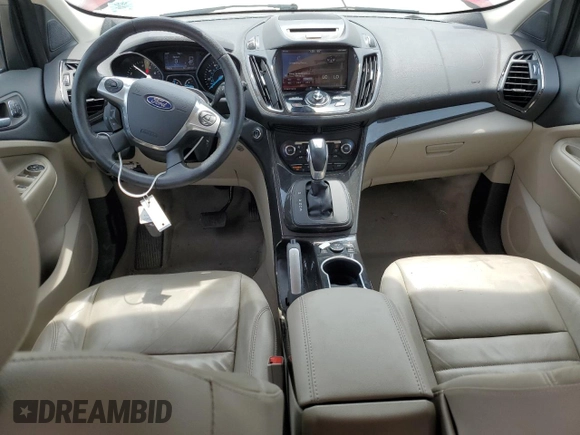 2015 Ford Escape Titanium with VIN 1FMCU0JX5FUC90567, listed as a Copart auction lot 60340775 with 67,287 mi miles and Salvage title. Bid and sale history available at DreamBid. Image 8.