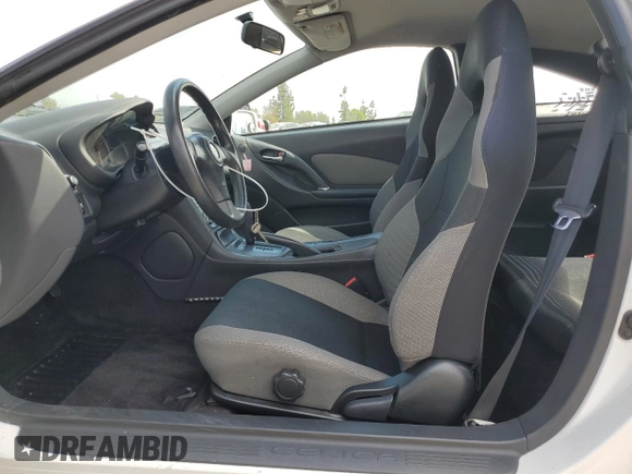 2004 Toyota Celica GT with VIN JTDDR32TX40174017, listed as a Copart auction lot 73748694 with 138,701 mi miles and Salvage Title. Bid and sale history available at DreamBid. Image 7.
