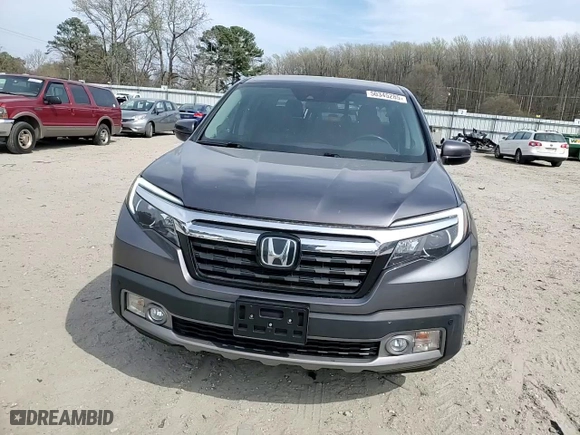 2020 Honda Ridgeline RTL-E with VIN 5FPYK3F73LB004981, listed as a Copart auction lot 50345285 with 76,547 mi miles and Salvage Title. Bid and sale history available at carsss.com. Image 11.