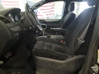 2014 Dodge Grand Caravan SXT 30th Anniversary with VIN 2C4RDGCG1ER200489, listed as a Copart auction lot 52558915 with 127,035 mi miles and Salvage Title. Bid and sale history available at DreamBid. Image 7.