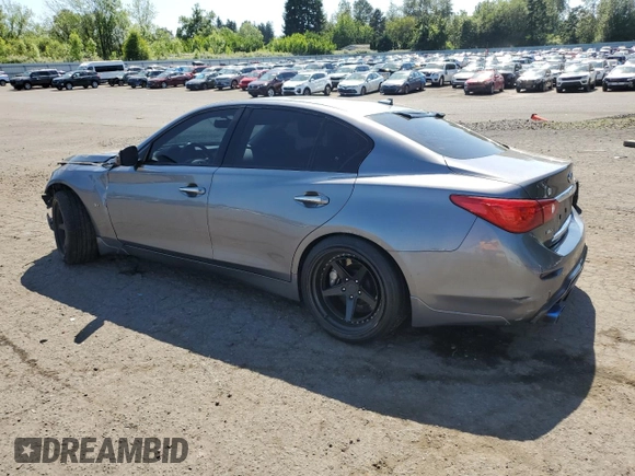2014 Infiniti Q50 Premium z VIN JN1BV7AR1EM693471, wystawiony jako Copart lot #58991305 z przebiegiem 144 323 mil mil oraz Szkoda całkowita • Salvage title. Historia ofert i sprzedaży dostępna na DreamBid. Obrazek 2.
