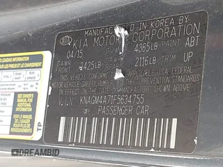 2015 Kia Optima LX with VIN KNAGM4A71F5634755, listed as a IAAI auction lot 42019729 with 101,064 mi miles and . Bid and sale history available at carsss.com. Image 9.